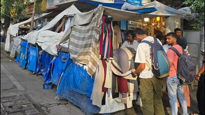 Stalls set up on footpaths on Colaba Causeway.