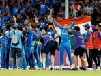 India Women's players celebrate after winning the ICC Women's World Cup 2025 final against South Africa Women at Dr DY Patil Sports Academy