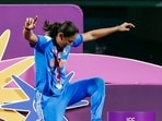 Harmanpreet Kaur shows off her moves as she arrives to receive the World Cup trophy. Harmanpreet Kaur shows off her moves as she arrives to receive the World Cup trophy.