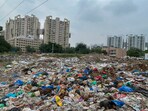Illegally dumped garbage near Sector 51 in Gurugram as of July 2025. (Parveen Kumar/HT)