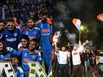 Indian women's team and fans celebrating the World Cup win. Indian women's team and fans celebrating the World Cup win.