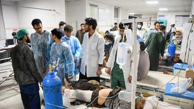 Afghan medical personnel treat wounded men at a hospital in the aftermath of an earthquake, that struck overnight in Mazar-i-Sharif. (AFP) Afghan medical personnel treat wounded men at a hospital in the aftermath of an earthquake, that struck overnight in Mazar-i-Sharif. (AFP)