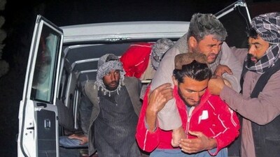As per the latest update from the Taliban health ministry, at least 20 people have been killed due to the strong tremors and over 300 are injured. In this photo, a man is carried out of a vehicle by rescue workers.&nbsp; (REUTERS)