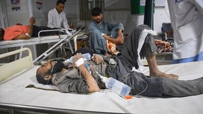Injured residents of a 6.3 powerful earthquake in northern Afghanistan wait for treatment at a hospital in Mazar-e-Sharif, Afghanistan, As rescue work continues in the Balkh and neighbouring provinces, the Taliban govt is bracing for more casualties. (AP) Injured residents of a 6.3 powerful earthquake in northern Afghanistan wait for treatment at a hospital in Mazar-e-Sharif, Afghanistan, As rescue work continues in the Balkh and neighbouring provinces, the Taliban govt is bracing for more casualties. (AP)