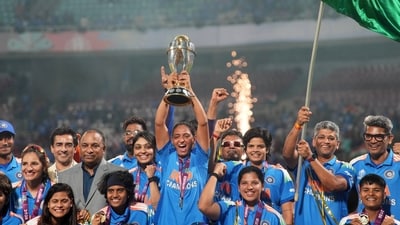 Indian players and BCCI secretary Devajit Saikia pose with the trophy after their win. (AP) Indian players and BCCI secretary Devajit Saikia pose with the trophy after their win. (AP)