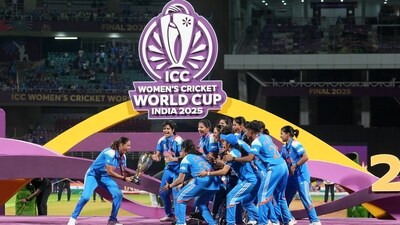 India's players pose with the winning trophy after their win over South Africa in the ICC Women's Cricket World Cup final. (AP) India's players pose with the winning trophy after their win over South Africa in the ICC Women's Cricket World Cup final. (AP)