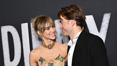 Suki Waterhouse and Robert Pattinson were all smiles as they attended the premiere of Die My Love. (Evan Agostini/Invision/AP)