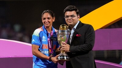 Harmanpreet Kaur receives the women's World Cup trophy from ICC chairman Jay Shah. (PTI)