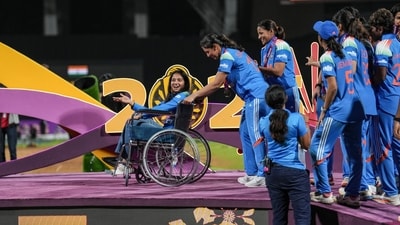 India’s Smriti Mandhana brings teammate Pratika Rawal on a wheelchair to receive medals during the presentation ceremony. (PTI) India’s Smriti Mandhana brings teammate Pratika Rawal on a wheelchair to receive medals during the presentation ceremony. (PTI)