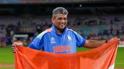 India coach Amol Muzumdar plants the tricolour on the pitch after the team’s ICC Women’s World Cup 2025 win at DY Patil Stadium. (PTI) India coach Amol Muzumdar plants the tricolour on the pitch after the team’s ICC Women’s World Cup 2025 win at DY Patil Stadium. (PTI)