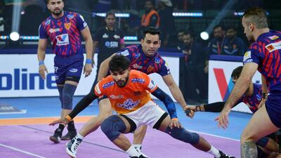 Puneri Paltan's raider in action against the Dabang Delhi KC defenders during the final match of Pro Kabaddi League (PKL) 2025 at Thyagaraj, in New Delhi on Friday. (Sathiya/ANI) Puneri Paltan's raider in action against the Dabang Delhi KC defenders during the final match of Pro Kabaddi League (PKL) 2025 at Thyagaraj, in New Delhi on Friday. (Sathiya/ANI)