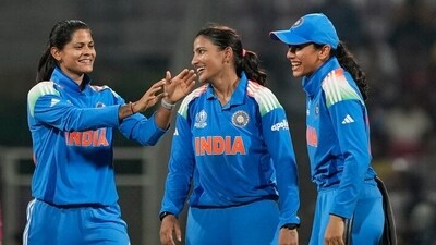 Sneh Rana (Centre) celebrating a wicket with team mates during a group stage match of the Women's World Cup.