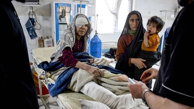 An Afghan injured woman receives treatment at a hospital in the aftermath of an earthquake, that struck overnight in Mazar-i-Sharif. As rescue work continues, the death toll due to the earthquake is expected to rise. (AFP) An Afghan injured woman receives treatment at a hospital in the aftermath of an earthquake, that struck overnight in Mazar-i-Sharif. As rescue work continues, the death toll due to the earthquake is expected to rise. (AFP)