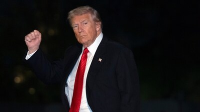 President Donald Trump gestures while walking across the South Lawn of the White House. (AP) President Donald Trump gestures while walking across the South Lawn of the White House. (AP)
