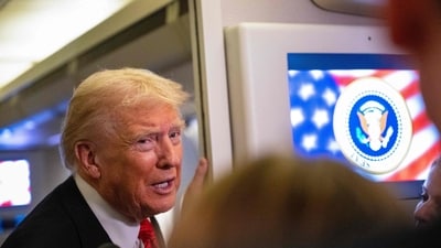 US President Donald Trump speaks to members of the press aboard Air Force One as he heads to Joint Base Andrews in Maryland. (AFP) US President Donald Trump speaks to members of the press aboard Air Force One as he heads to Joint Base Andrews in Maryland. (AFP)