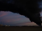 A plume of smoke wafts over airport property after reports of a plane crash at Louisville International Airport, Tuesday. A plume of smoke wafts over airport property after reports of a plane crash at Louisville International Airport, Tuesday.