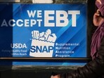 A SNAP EBT information sign is displayed at a bakery in Chicago. (Representational)