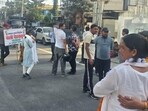 Protestors near Rispana bridge in Dehradun. (HT Photo)