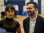 Democratic Mayoral Candidate Zohran Mamdani (R) and his wife, Rama Duwaji (L), address the media as they vote at The Frank Sinatra School of the Arts on November 04, 2025 in the Queens borough of New York City.&nbsp;