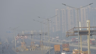 In the early morning, drivers can be seen moving with the red lights of their vehicles on, along the Delhi-Meerut Expressway, in Ghaziabad, ( (Photo by / Hindustan Times))