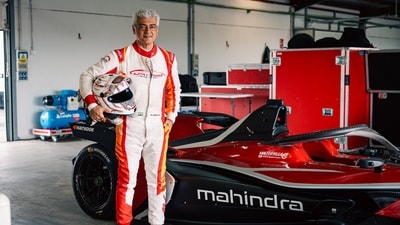 Ajith Kumar with the Formula E car made by Mahindra in Spain. Ajith Kumar with the Formula E car made by Mahindra in Spain.