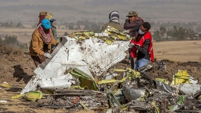 In this March 11, 2019, file photo, rescuers work at the scene of an Ethiopian Airlines flight crash near Bishoftu, Ethiopia. (AP) In this March 11, 2019, file photo, rescuers work at the scene of an Ethiopian Airlines flight crash near Bishoftu, Ethiopia. (AP)