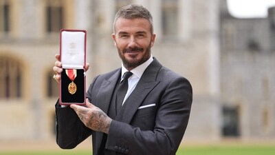 David Beckham poses with their medal after being appointed as a Knight Bachelor (Knighthood) for services to sport and charity. (AFP) David Beckham poses with their medal after being appointed as a Knight Bachelor (Knighthood) for services to sport and charity. (AFP)