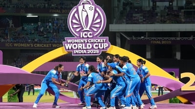 India's players pose with the winning trophy after their win over South Africa in the ICC Women's Cricket World Cup final. (AP)