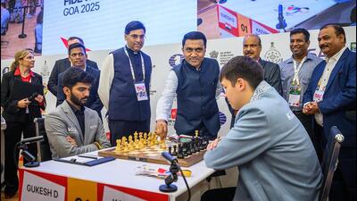 Pramod Sawant, Chief Minister of Goa, making the first move for GM Gukesh D during Game 1 of Round 2. (Michal Walusza/FIDE) Pramod Sawant, Chief Minister of Goa, making the first move for GM Gukesh D during Game 1 of Round 2. (Michal Walusza/FIDE)