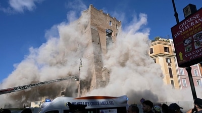 Clouds of dust came billowing out of the windows to the sound of collapsing masonry. The second incident took place while firefighters were working on the structure with aerial ladders. (AFP) Clouds of dust came billowing out of the windows to the sound of collapsing masonry. The second incident took place while firefighters were working on the structure with aerial ladders. (AFP)