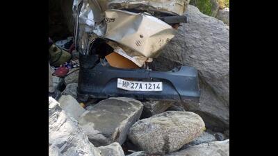 The mangled remains of the car after it met with an accident in Mandi’s Karsog on Tuesday. (Birbal Sharma/HT)