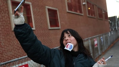 Lyla Huber poses for a photo after voting in the General Election at the P.S. 249 the Caton School on November 04, 2025 in the Flatbush neighborhood of the Brooklyn borough in New York City. (Getty Images via AFP) Lyla Huber poses for a photo after voting in the General Election at the P.S. 249 the Caton School on November 04, 2025 in the Flatbush neighborhood of the Brooklyn borough in New York City. (Getty Images via AFP)