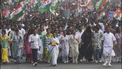 West Bengal Chief Minister and TMC supremo Mamata Banerjee takes part in a protest rally against the Special Intensive Revision (SIR) of electoral rolls, in Kolkata, on Tuesday. (PTI) West Bengal Chief Minister and TMC supremo Mamata Banerjee takes part in a protest rally against the Special Intensive Revision (SIR) of electoral rolls, in Kolkata, on Tuesday. (PTI)