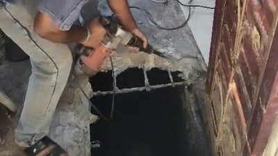 Within 10 to 15 minutes, a police team reached the spot along with the fire brigade and private workers to cut open the tank’s manhole. (HT Photo) Within 10 to 15 minutes, a police team reached the spot along with the fire brigade and private workers to cut open the tank’s manhole. (HT Photo)