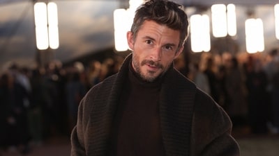 The Bridgerton star turned heads at the Burberry SS26 show during London Fashion Week, looking effortlessly dashing in a smouldering ensemble - a long brown coat layered over a sleek black turtleneck. (REUTERS)