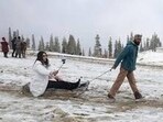 MeT director Mukhtar Ahmad said that the feeble western disturbance will result in light snowfall in higher reaches and rain in some plains till morning of October 5. (HT representative)