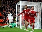 Liverpool's Alexis Mac Allister celebrates scoring their first goal with Hugo Ekitike 