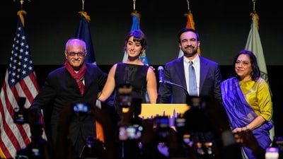 New York City's mayor-elect Zohran Mamdani with his wife Rama Duwaji, father Mahmood Mamdani and mother Mira Nair after making an acceptance speech. (AP) New York City's mayor-elect Zohran Mamdani with his wife Rama Duwaji, father Mahmood Mamdani and mother Mira Nair after making an acceptance speech. (AP)