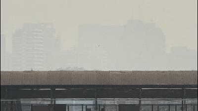 Beyond the station, the horizon is flanked by the high-rises of Connaught Place. Those familiar towers are today partly shrouded in smog. (HT Photo) Beyond the station, the horizon is flanked by the high-rises of Connaught Place. Those familiar towers are today partly shrouded in smog. (HT Photo)