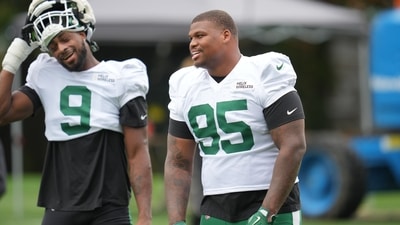 Quinnen Williams, right, and New York Jets defensive end Will McDonald IV react during NFL football practice. (AP) Quinnen Williams, right, and New York Jets defensive end Will McDonald IV react during NFL football practice. (AP)