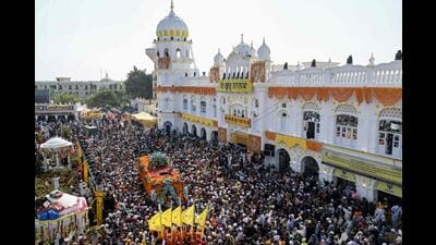 Sikh devotees gather around a bus carrying the Guru Granth Sahib, the Sikh holy book, during a religious procession on the occasion of the birth anniversary of Guru Nanak Dev, the founder of Sikhism, in Nankana Sahib, in the Punjab province of Pakistan, on Wednesday. (AFP) Sikh devotees gather around a bus carrying the Guru Granth Sahib, the Sikh holy book, during a religious procession on the occasion of the birth anniversary of Guru Nanak Dev, the founder of Sikhism, in Nankana Sahib, in the Punjab province of Pakistan, on Wednesday. (AFP)