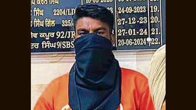 The accused in police custody on Wednesday. (HT Photo) The accused in police custody on Wednesday. (HT Photo)
