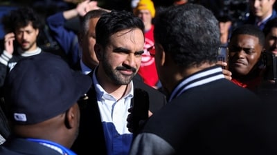 Democratic candidate for New York City mayor, Zohran Mamdani greets voters, during the New York City mayoral election (REUTERS)