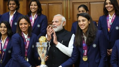 Indian team with the World Cup trophy and PM Narendra Modi (@ANI/x.com)