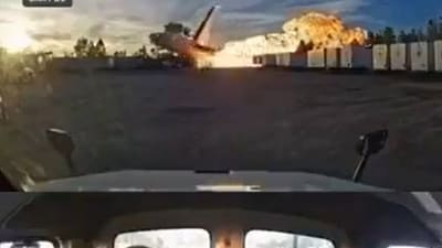 In the video, the driver can be seen seated in his vehicle, then jumping out after hearing an explosive sound. Shocked, he exclaimed, "oh my god." (X/@AZ_Intel_) In the video, the driver can be seen seated in his vehicle, then jumping out after hearing an explosive sound. Shocked, he exclaimed, "oh my god." (X/@AZ_Intel_)