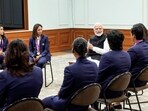 Prime Minister Narendra Modi in conversation with the champions of ICC Women's Cricket World Cup 2025 at his residence in New Delhi on Wednesday.