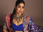 Janhvi Kapoor wore a choker with coloured stones to complete her look. Janhvi Kapoor wore a choker with coloured stones to complete her look.
