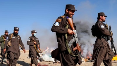 Taliban security personnel (AFP) Taliban security personnel (AFP)