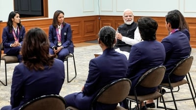 Prime Minister Narendra Modi in conversation with the champions of ICC Women's Cricket World Cup 2025 at his residence in New Delhi on Wednesday. (DPR PMO/ANI Photo) Prime Minister Narendra Modi in conversation with the champions of ICC Women's Cricket World Cup 2025 at his residence in New Delhi on Wednesday. (DPR PMO/ANI Photo)