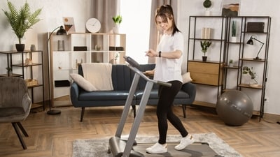 Stay fit at home with smart, space-saving treadmills for daily effective workouts. (Adobe )